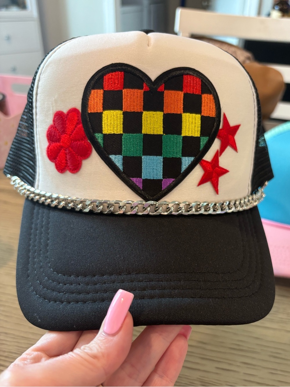 Black and White Trucker Hat with Rainbow Heart